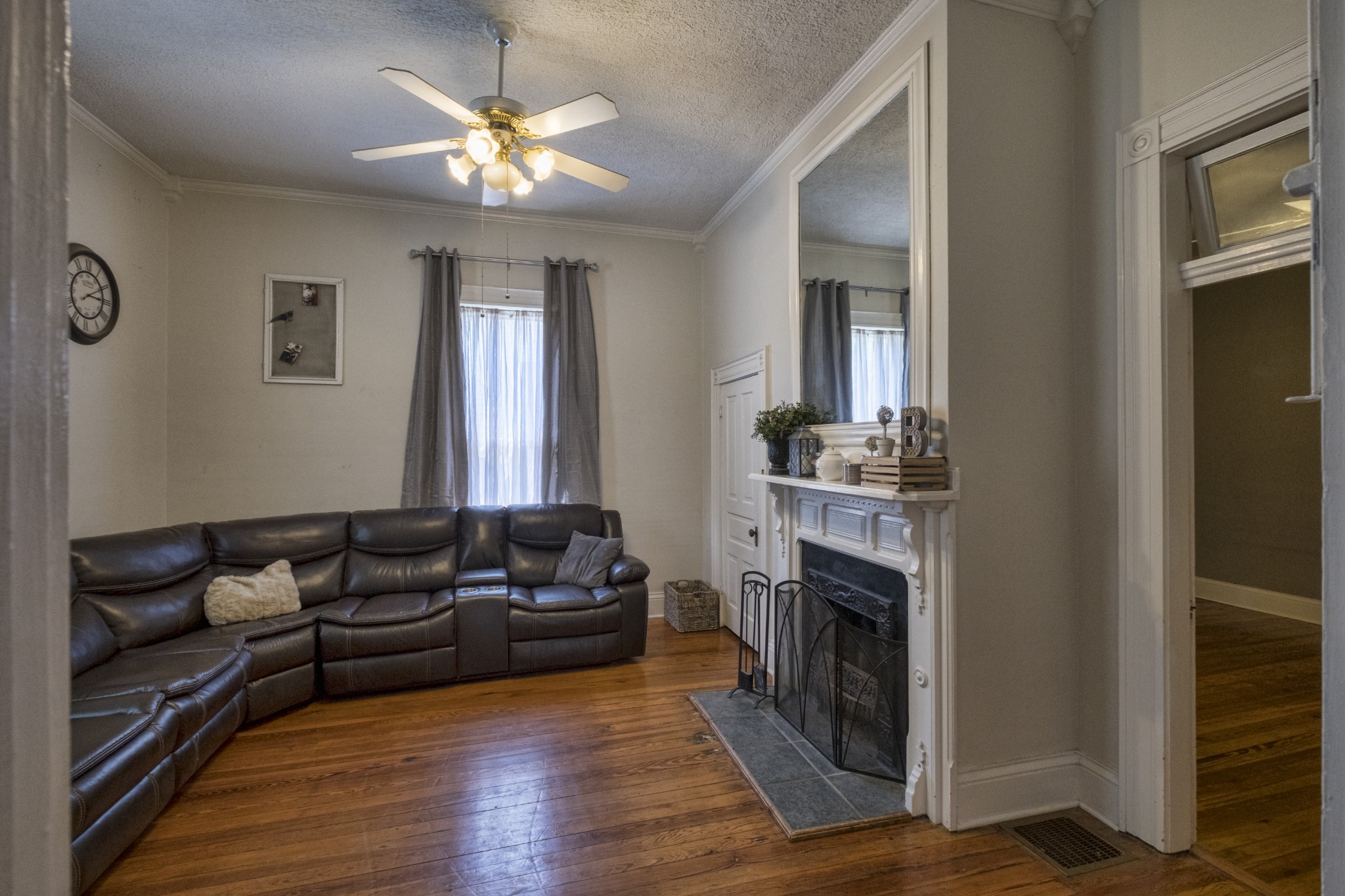 211 North Main Street Springfield, TN 37172 - Photo 23 of 30 a living room with furniture and a fireplace
