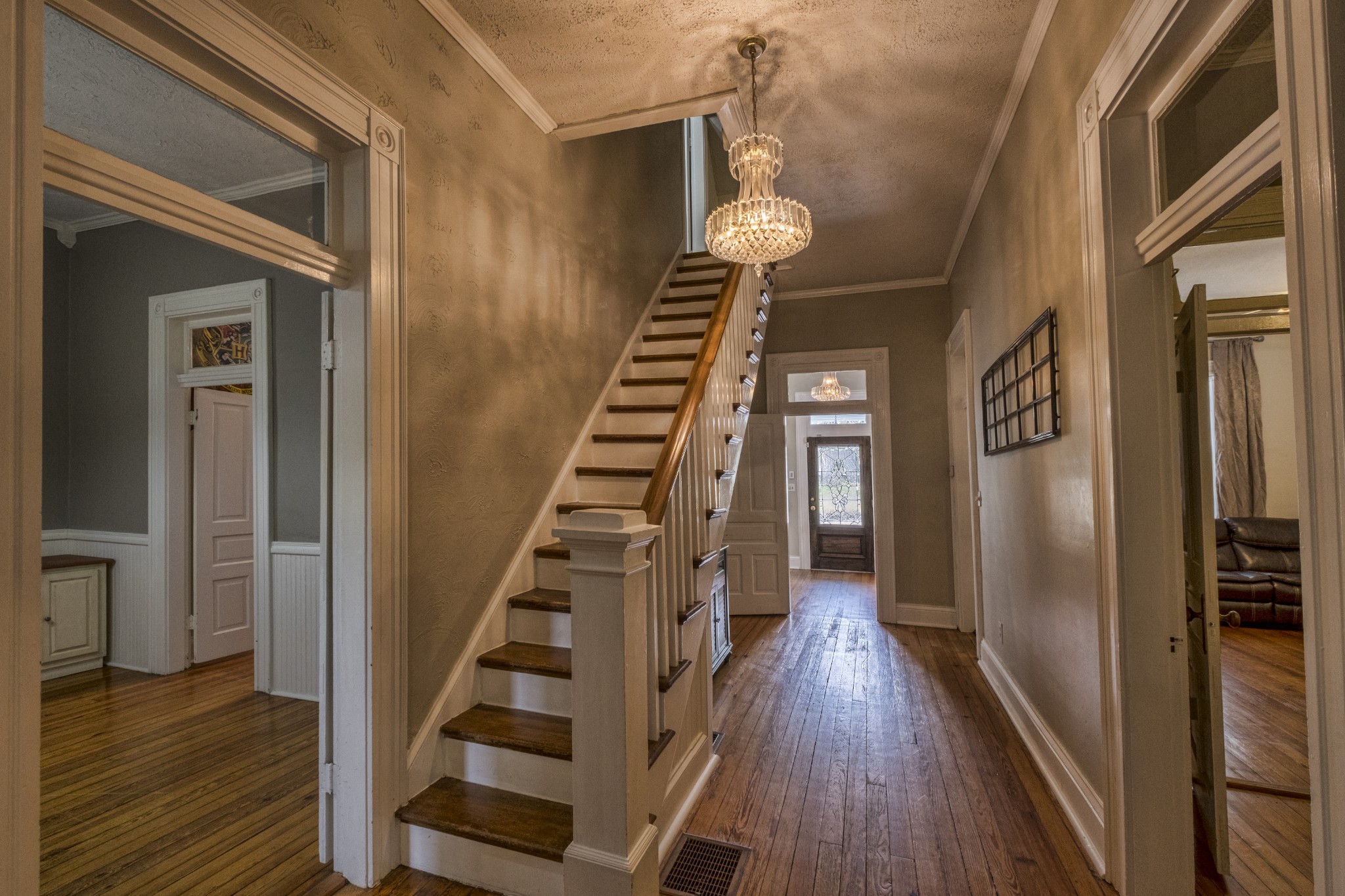 211 North Main Street Springfield, TN 37172 - Photo 24 of 30 a view of a hallway with wooden floor and staircase