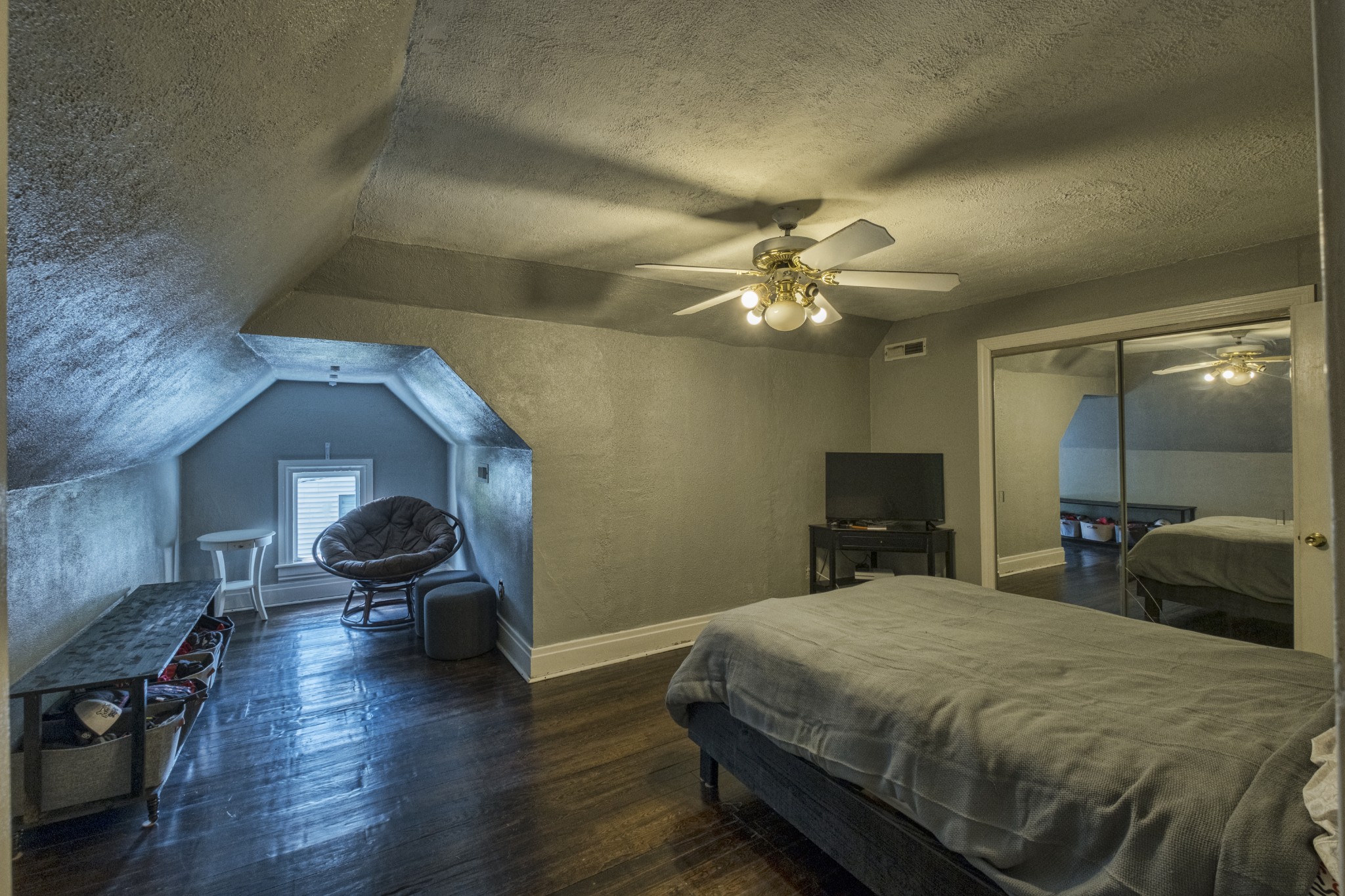 211 North Main Street Springfield, TN 37172 - Photo 26 of 30 a spacious bedroom with a bed and wooden floor