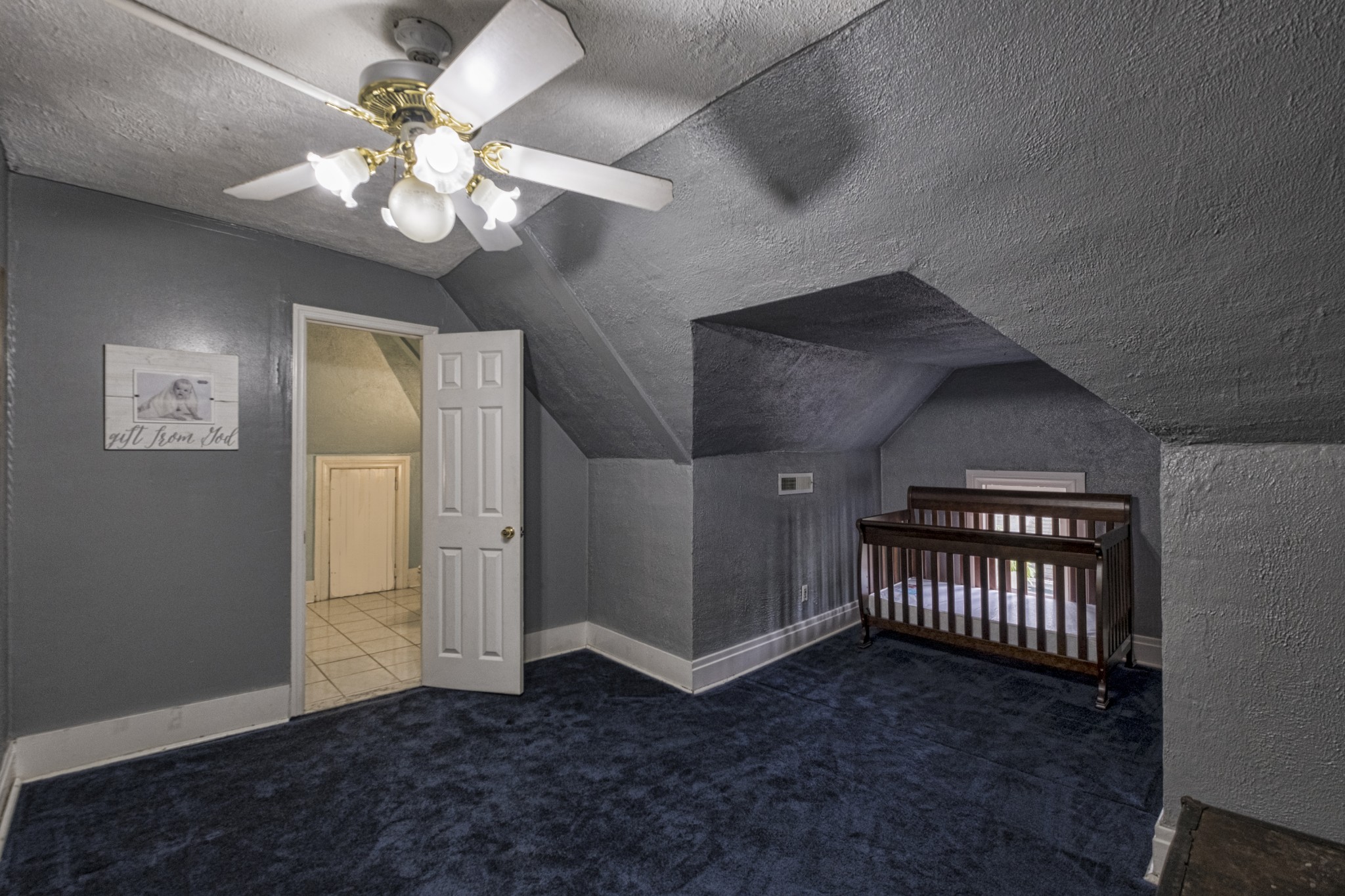 211 North Main Street Springfield, TN 37172 - Photo 30 of 30 an empty room with windows and ceiling fan