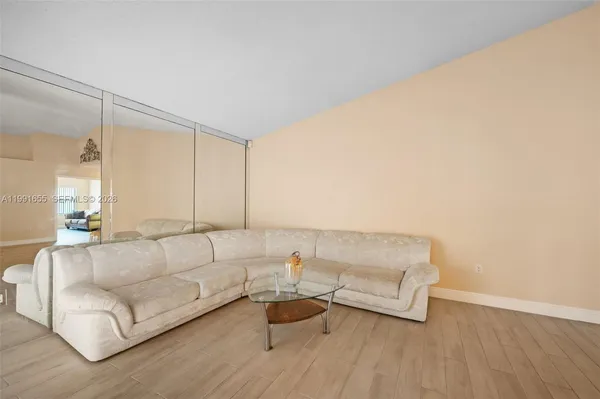 a living room with furniture and a couch