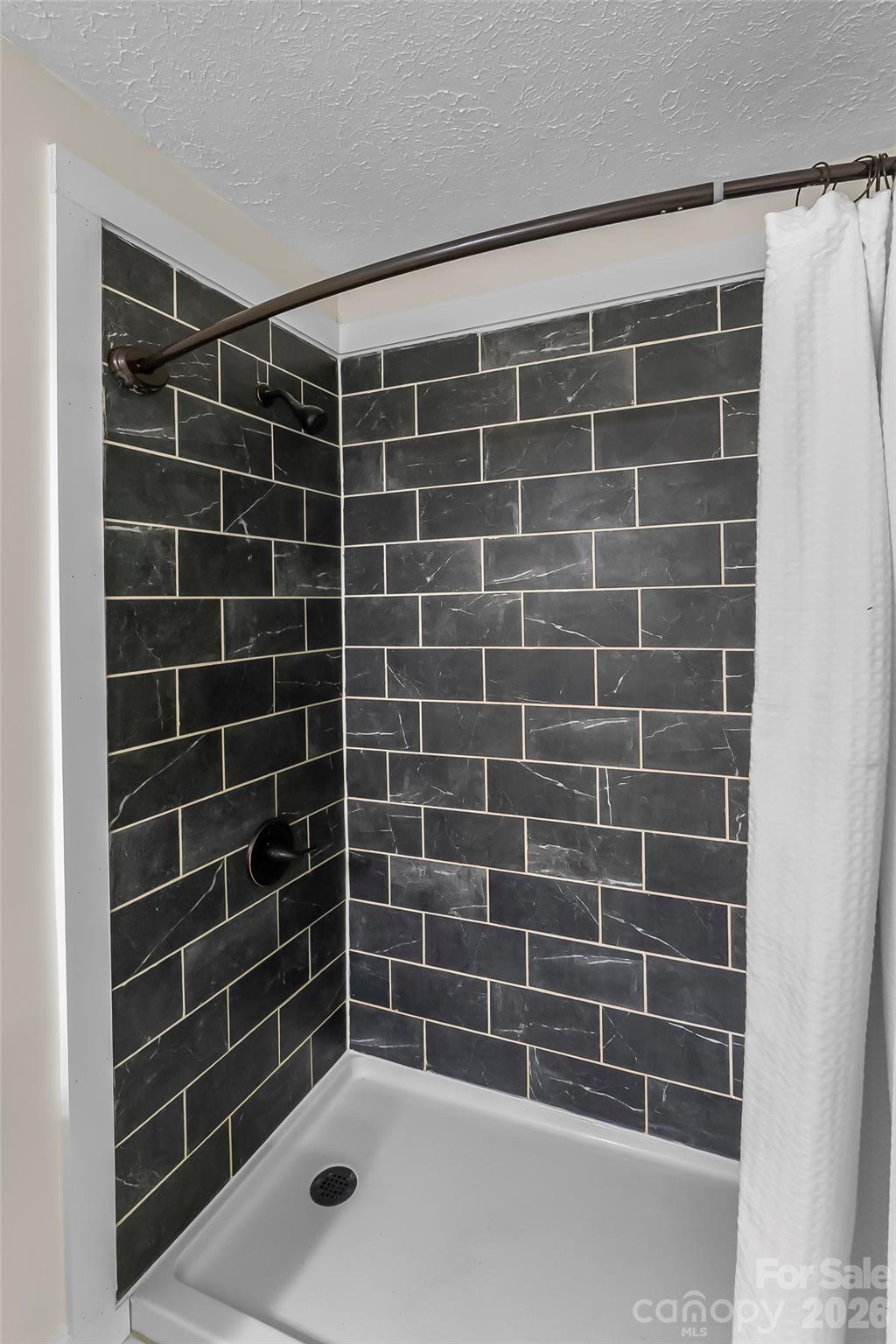 825 South Creek Road Nebo, NC 28761 - Photo 21 of 34 a bathroom with a shower