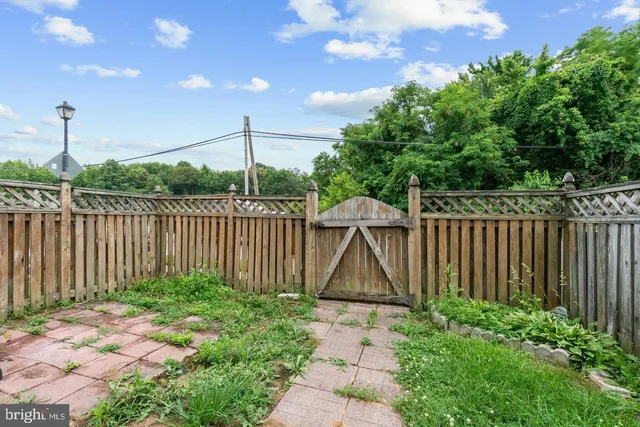 a front view of a house having yard