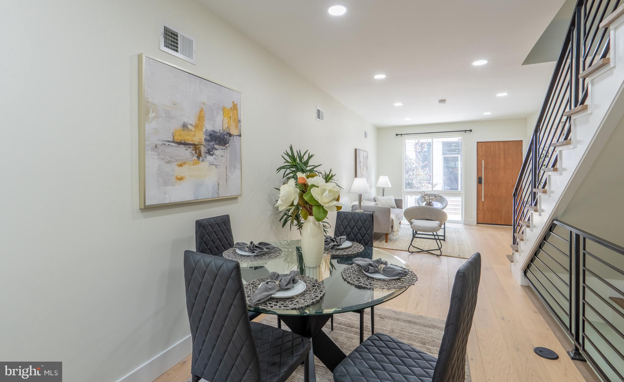 622 McClellan Street Philadelphia, PA 19148 - Photo 12 of 52 a view of a dining room with furniture and wooden floor