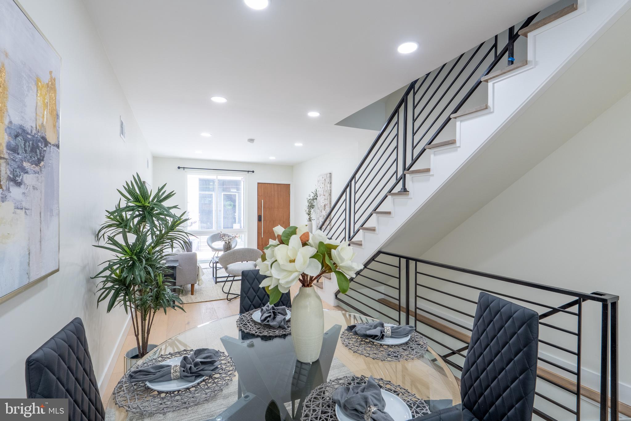 622 McClellan Street Philadelphia, PA 19148 - Photo 13 of 52 a living room with furniture potted plant and a rug