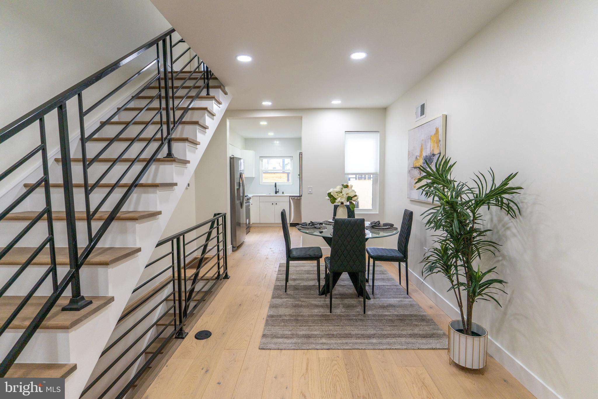 622 McClellan Street Philadelphia, PA 19148 - Photo 3 of 52 a view of a dining room with furniture and a potted plant