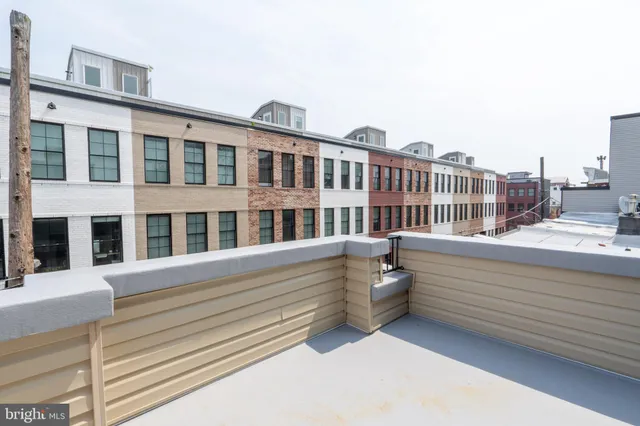 a view of a building from a balcony