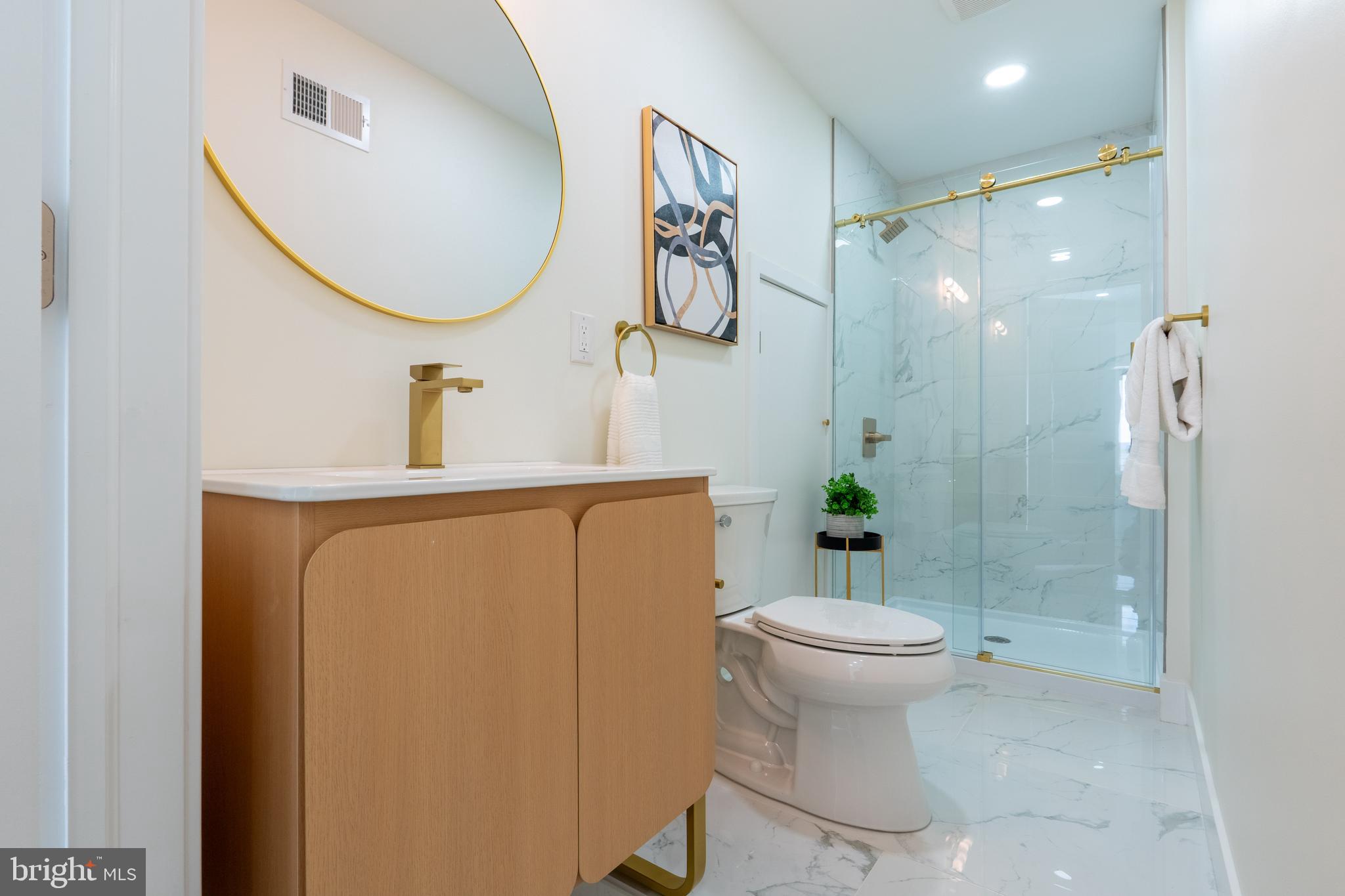 622 McClellan Street Philadelphia, PA 19148 - Photo 37 of 52 a bathroom with a sink toilet and shower