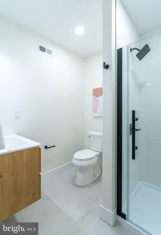 a view of a balcony with chairs