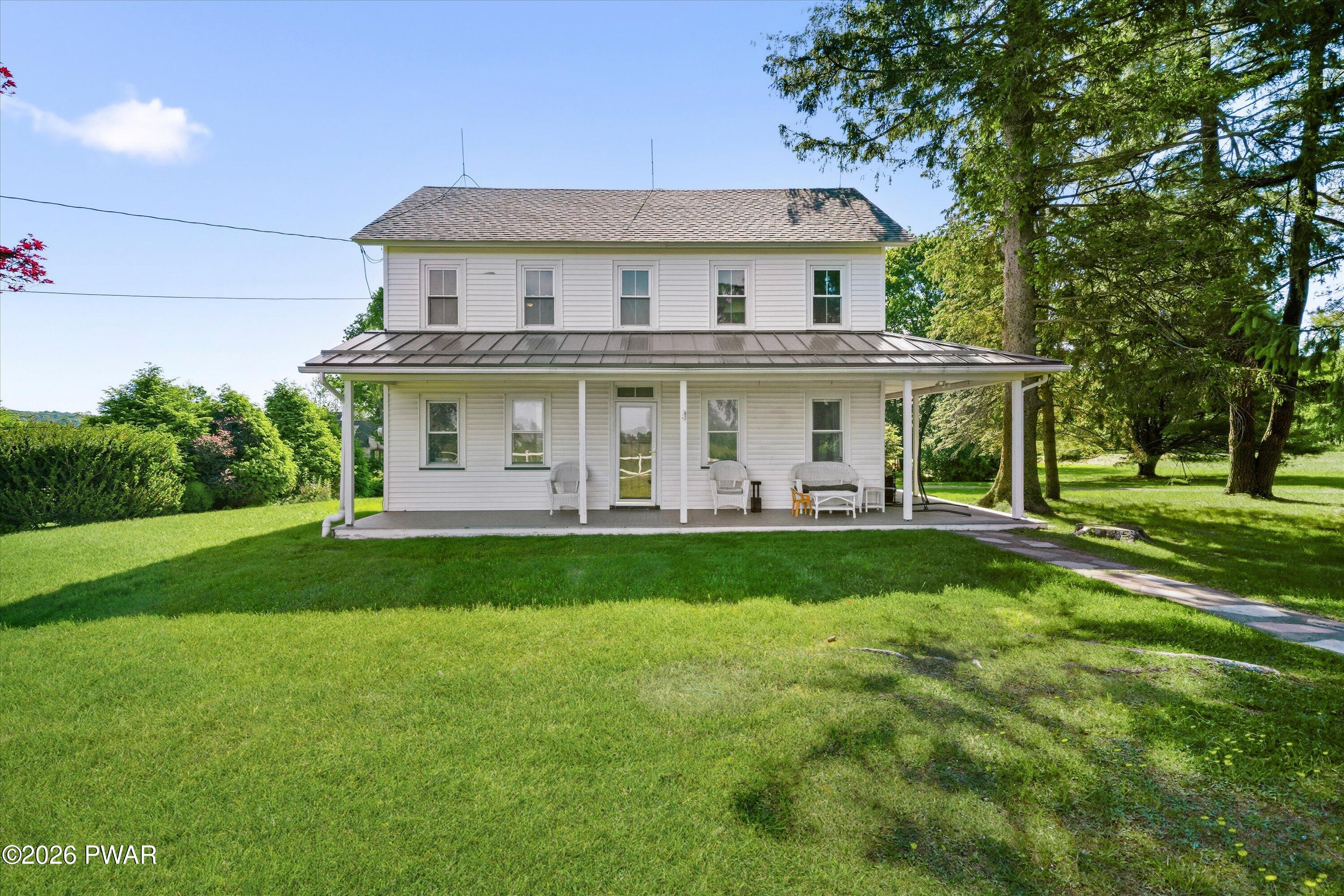 127 Valleyview Road Greentown, PA 18426 - Photo 57 of 66 a view of a house with a yard