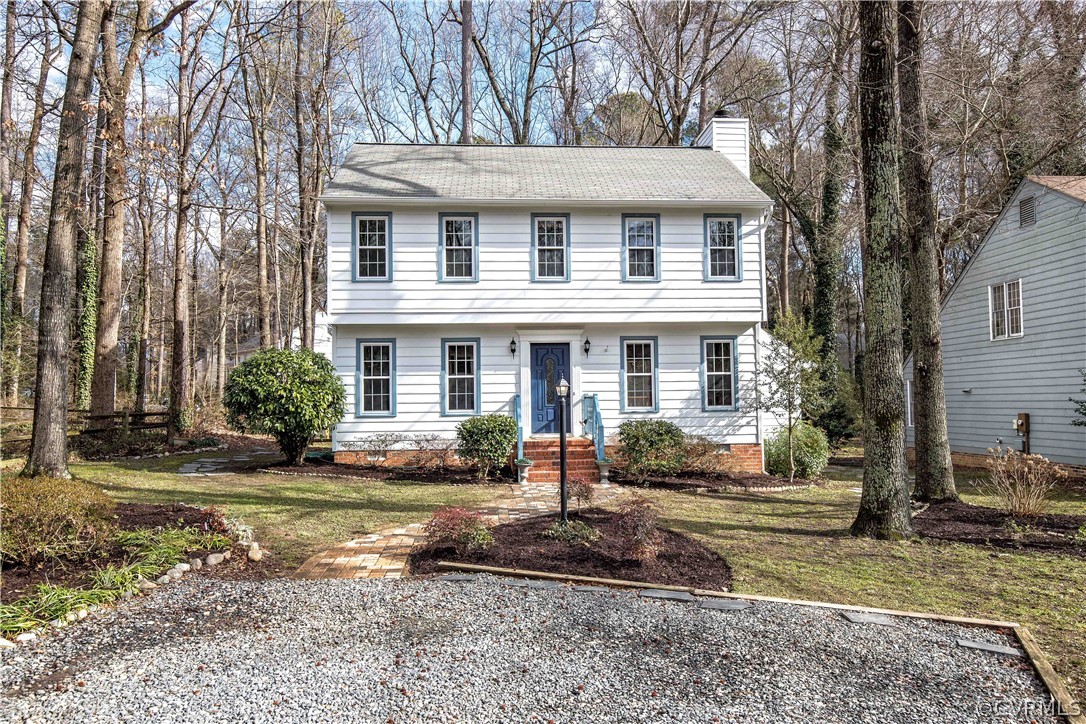 3003 Sagegrove Road Midlothian, VA 23112 - Photo 2 of 22 a front view of a house with a yard