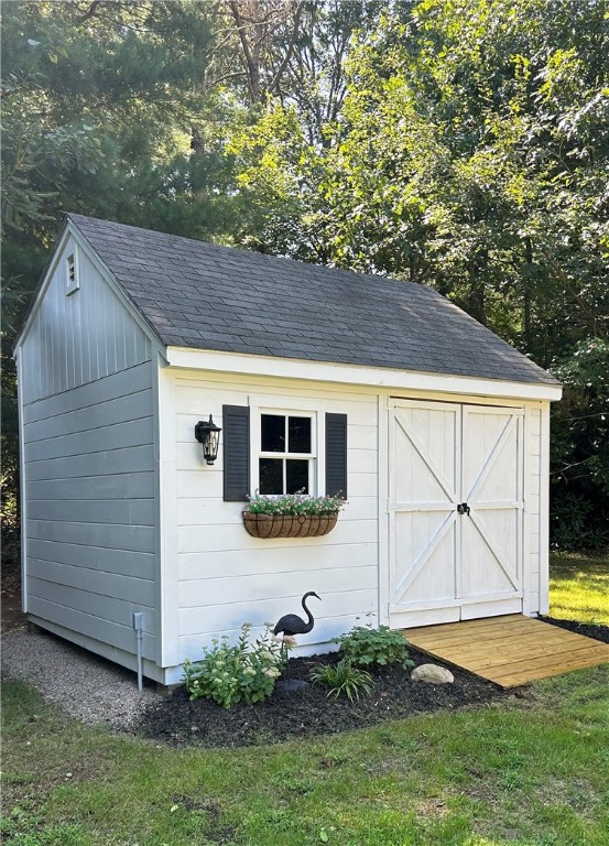 187 Post Road Westerly, RI 02891 - Photo 34 of 42 Storage shed with work bench