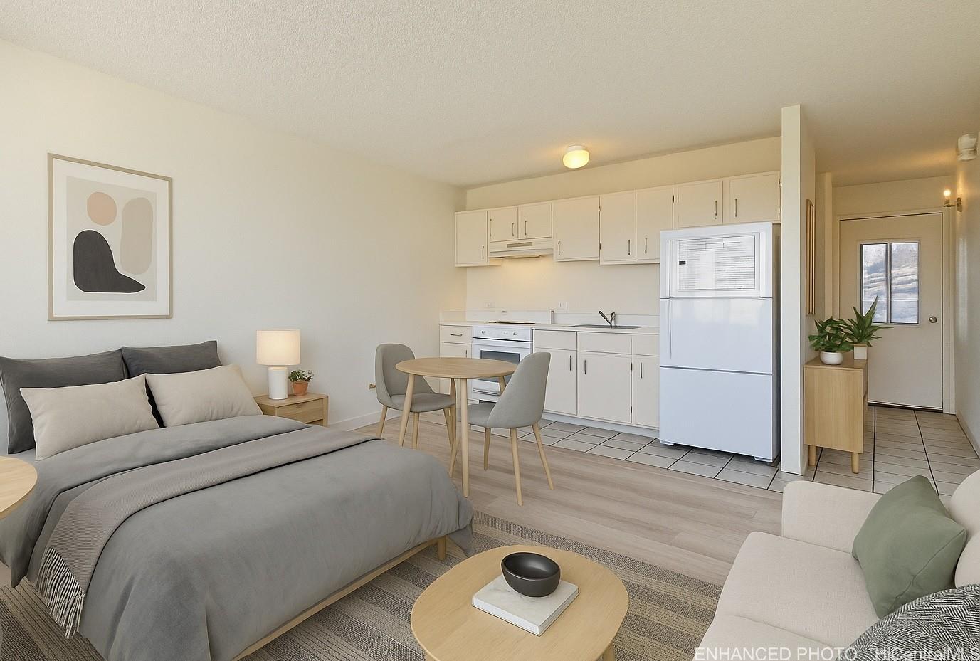 3045 Ala Napuaa Place, Unit 1613 Honolulu, HI 96818 - Photo 4 of 20 a living room with furniture and a rug