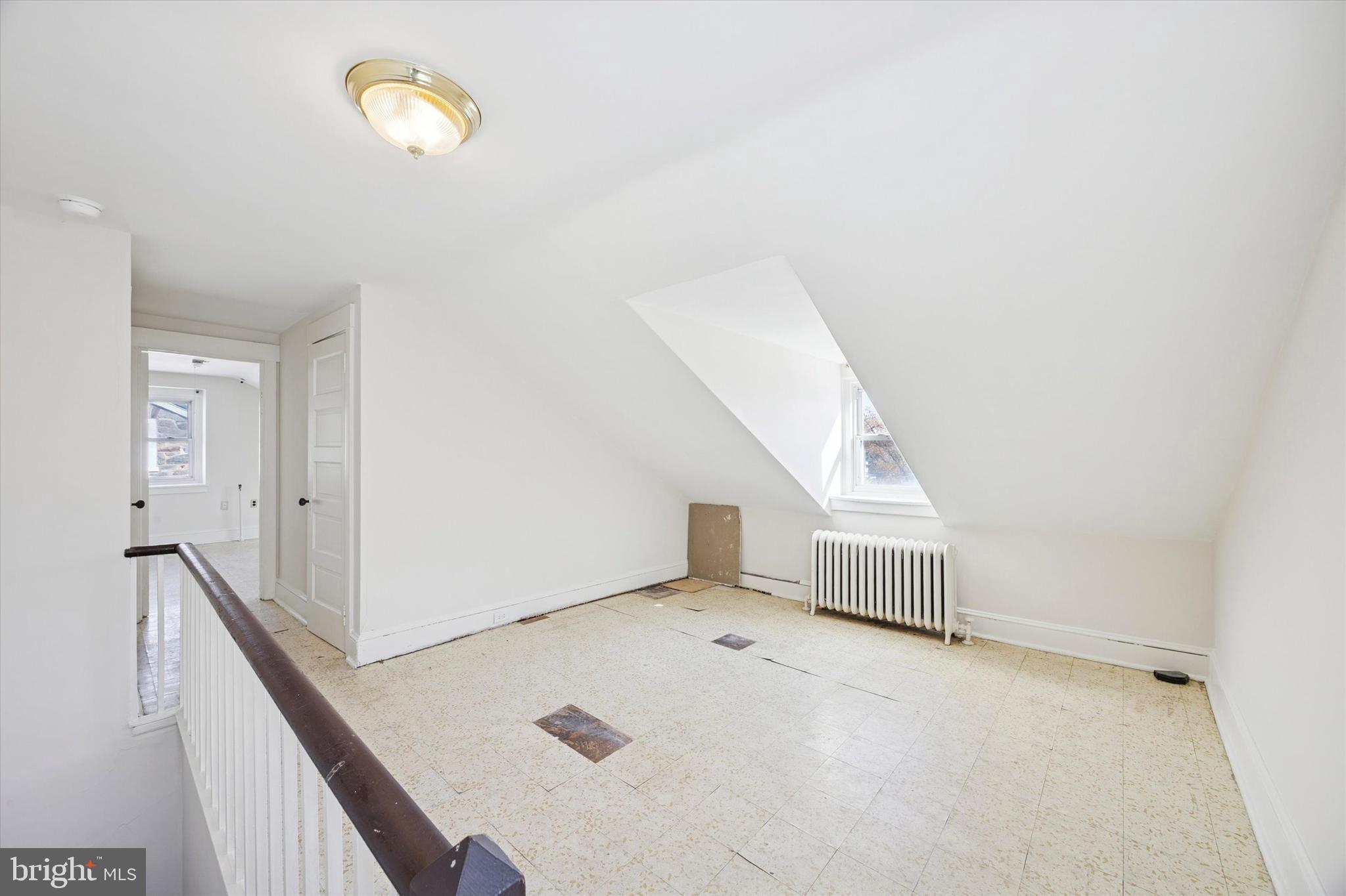 46 Copley Road Upper Darby, PA 19082 - Photo 16 of 21 a view of a livingroom with a staircase