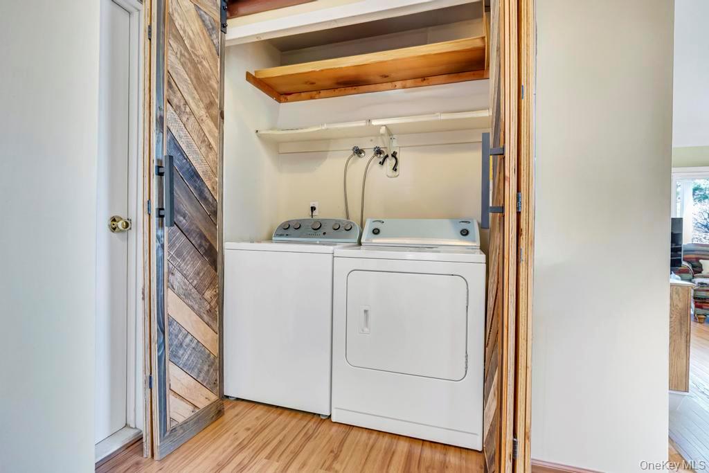 13 Mallard Path Coram, NY 11727 - Photo 25 of 39 a utility room with dryer and washer