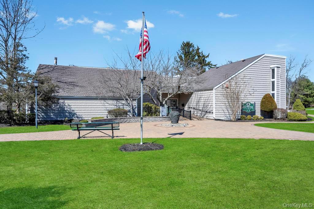 13 Mallard Path Coram, NY 11727 - Photo 26 of 39 a view of a backyard with sitting area