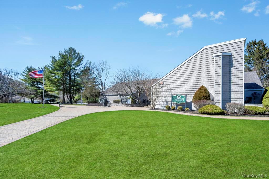 13 Mallard Path Coram, NY 11727 - Photo 27 of 39 a view of a house with a backyard