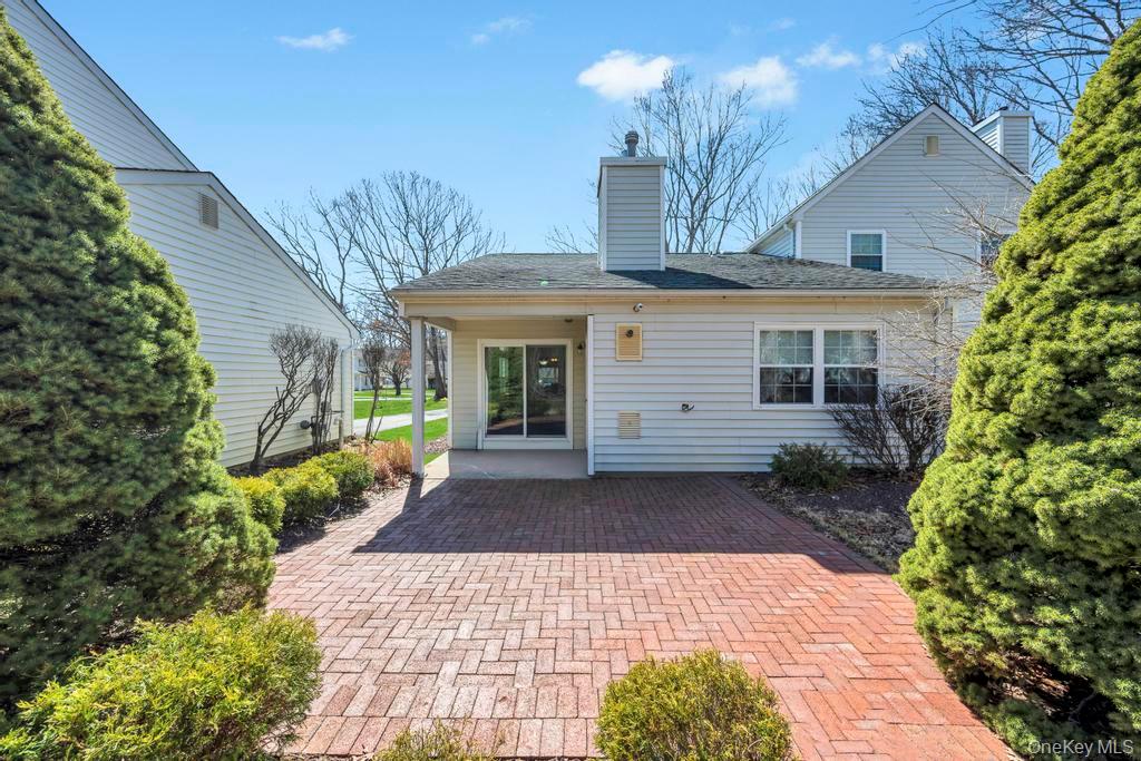 13 Mallard Path Coram, NY 11727 - Photo 3 of 39 a view of a house with a yard