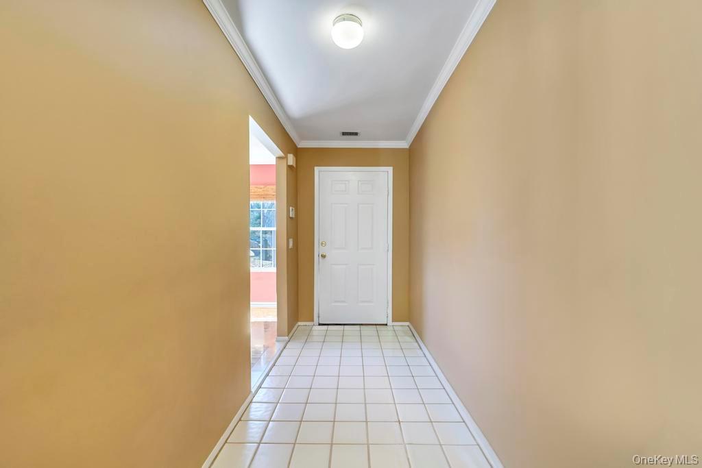 13 Mallard Path Coram, NY 11727 - Photo 6 of 39 a view of a hallway