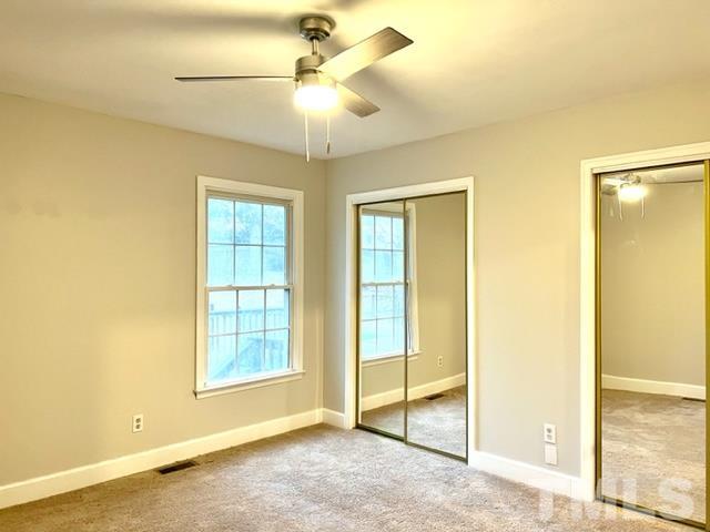 115 Kerr Lake Club Road Henderson, NC 27537 - Photo 13 of 20 a view of an empty room with a window