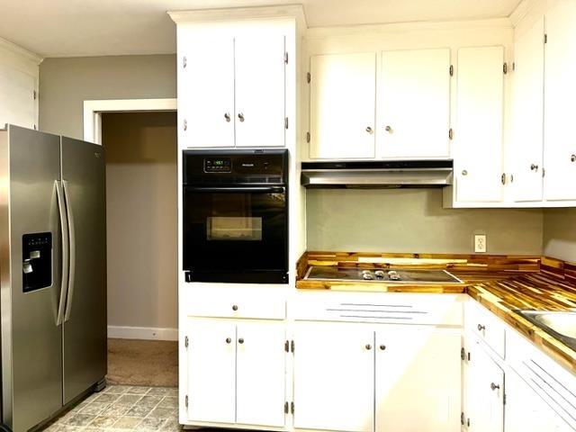 115 Kerr Lake Club Road Henderson, NC 27537 - Photo 7 of 20 a kitchen with stainless steel appliances a stove a refrigerator a sink and white cabinets