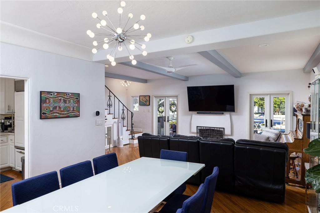 90 Rivo Alto Canal Long Beach, CA 90803 - Photo 15 of 52 a view of a dining room with furniture and a flat screen tv
