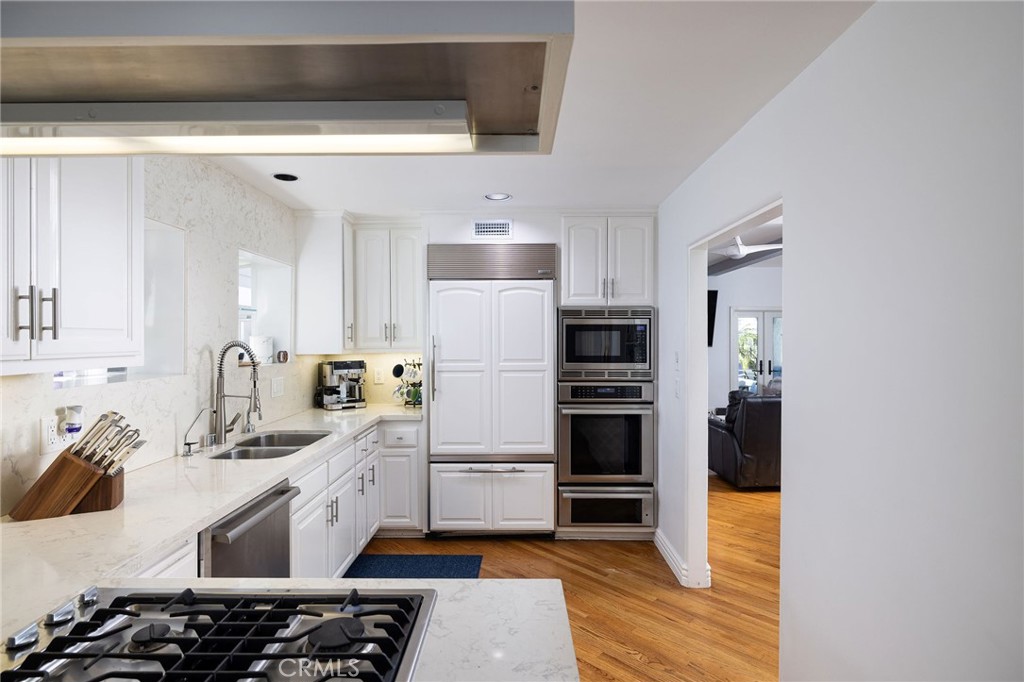 90 Rivo Alto Canal Long Beach, CA 90803 - Photo 17 of 52 a kitchen with a sink appliances and cabinets