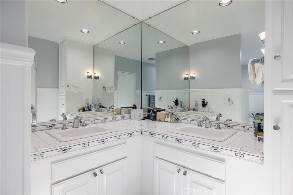 90 Rivo Alto Canal Long Beach, CA 90803 - Photo 31 of 52 a view with double vanity sink a mirror a lamp and vanity