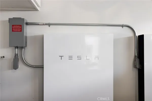 a view of a patio with couches chairs and a fire pit