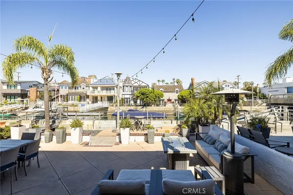 a view of a terrace with furniture and a potted plant