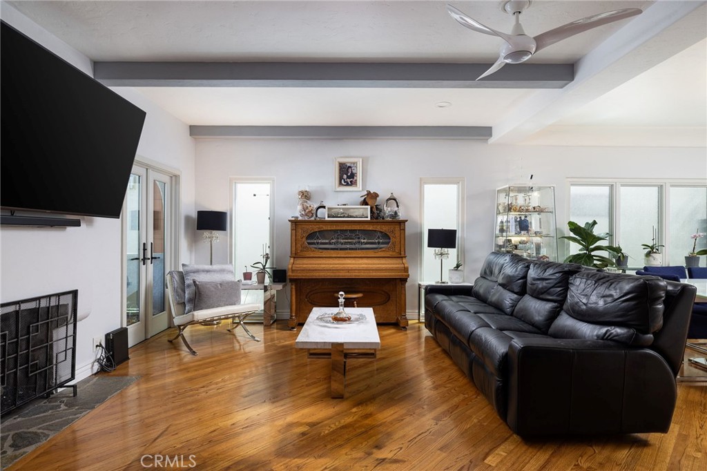 90 Rivo Alto Canal Long Beach, CA 90803 - Photo 9 of 52 a living room with furniture and a flat screen tv