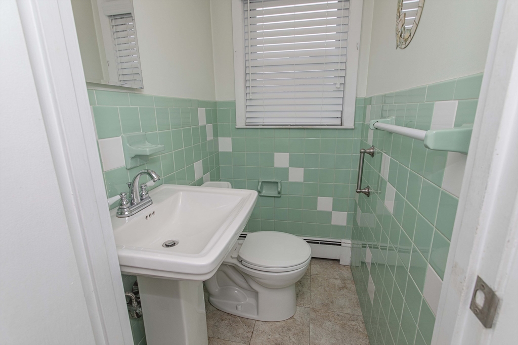 71 Vallaro Road Boston, MA 02136 - Photo 15 of 37 a bathroom with a sink and toilet