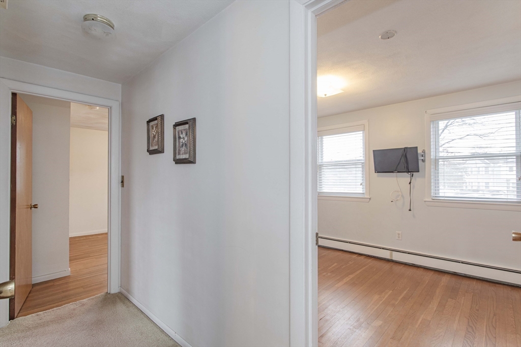 71 Vallaro Road Boston, MA 02136 - Photo 18 of 37 a view of an empty room and window