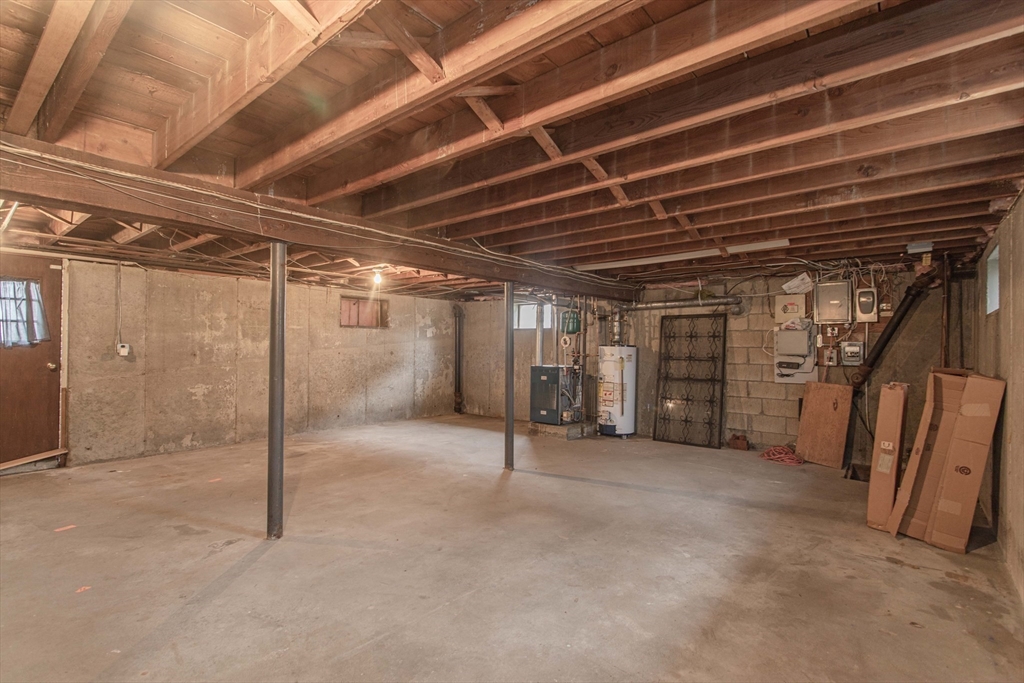 71 Vallaro Road Boston, MA 02136 - Photo 26 of 37 a view of empty room with wooden ceiling