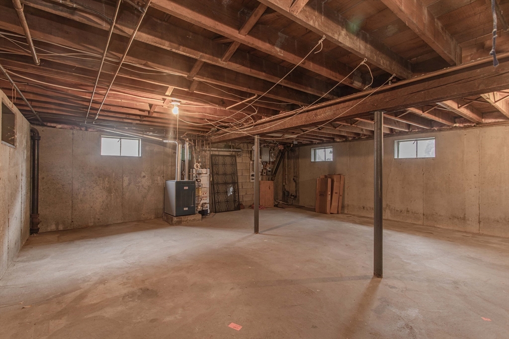 71 Vallaro Road Boston, MA 02136 - Photo 28 of 37 a view of empty room with wooden ceiling
