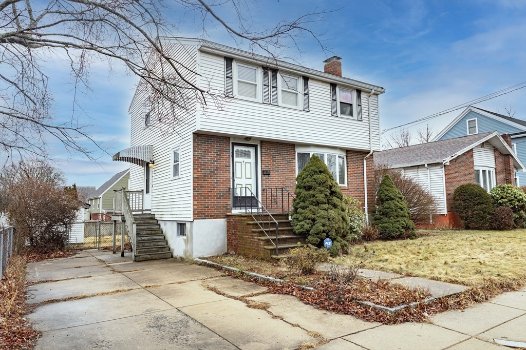 71 Vallaro Road Boston, MA 02136 - Photo 3 of 37 a front view of a house with garden