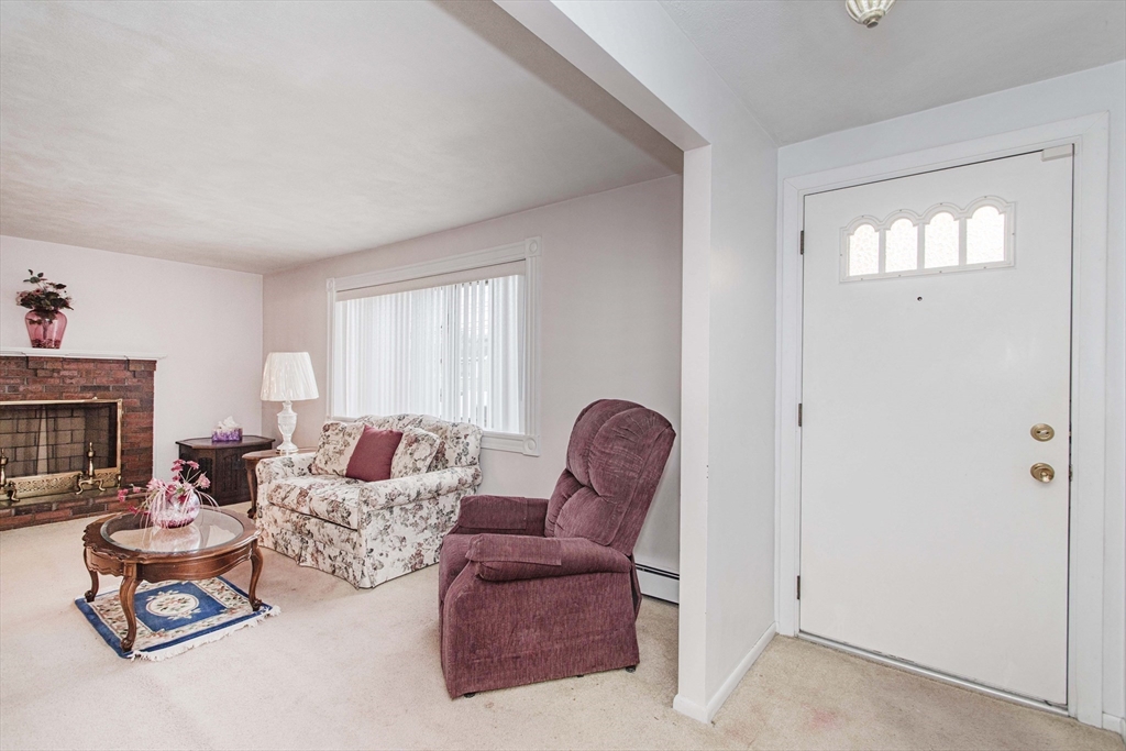 71 Vallaro Road Boston, MA 02136 - Photo 4 of 37 a living room with furniture