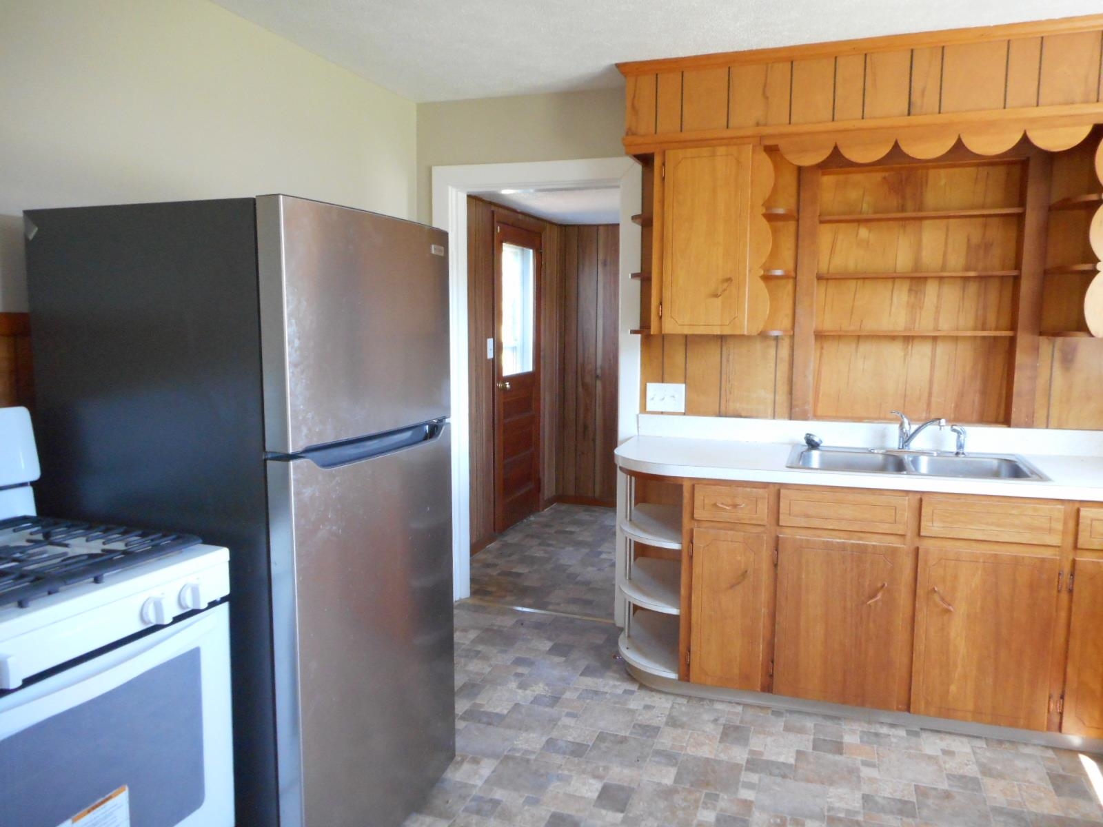 18874 Huckleberry Road Elkton, VA 22827 - Photo 15 of 23 a kitchen with a refrigerator and a sink