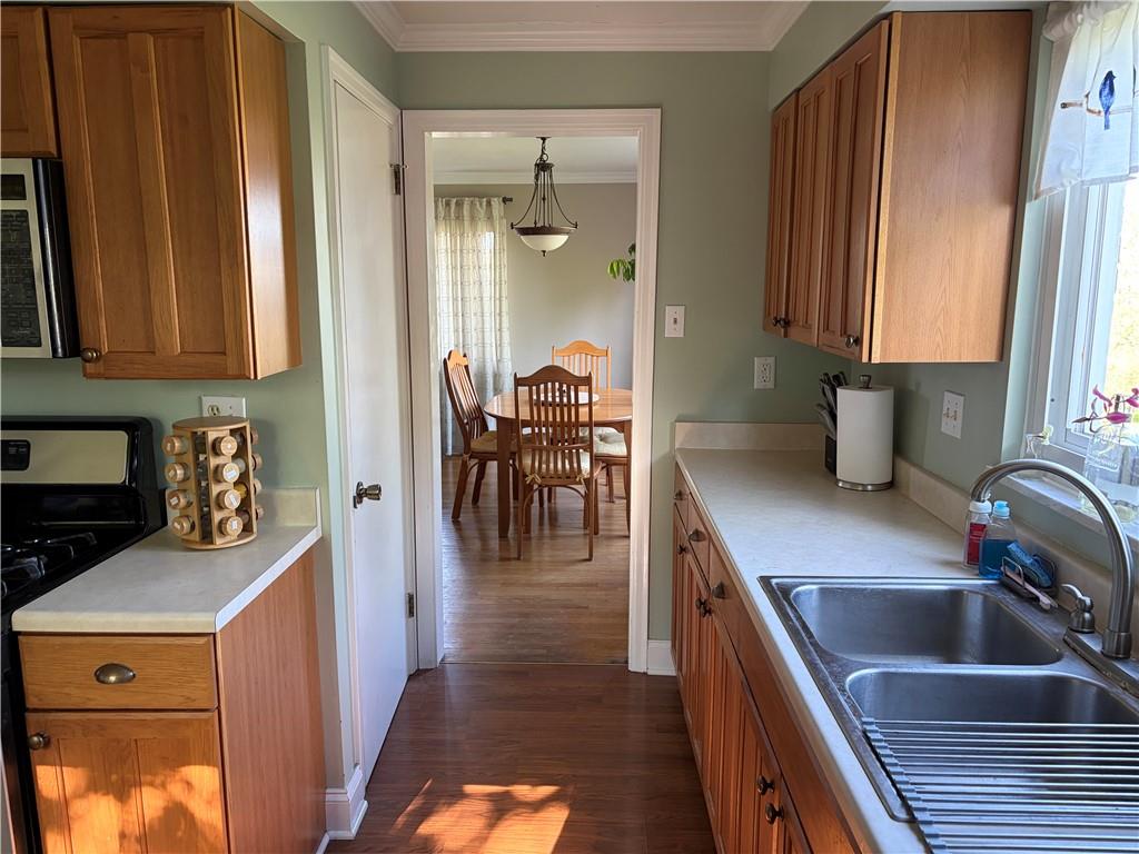 359 Dorseyville Road Pittsburgh, PA 15215 - Photo 8 of 29 a kitchen with a sink a stove and cabinets