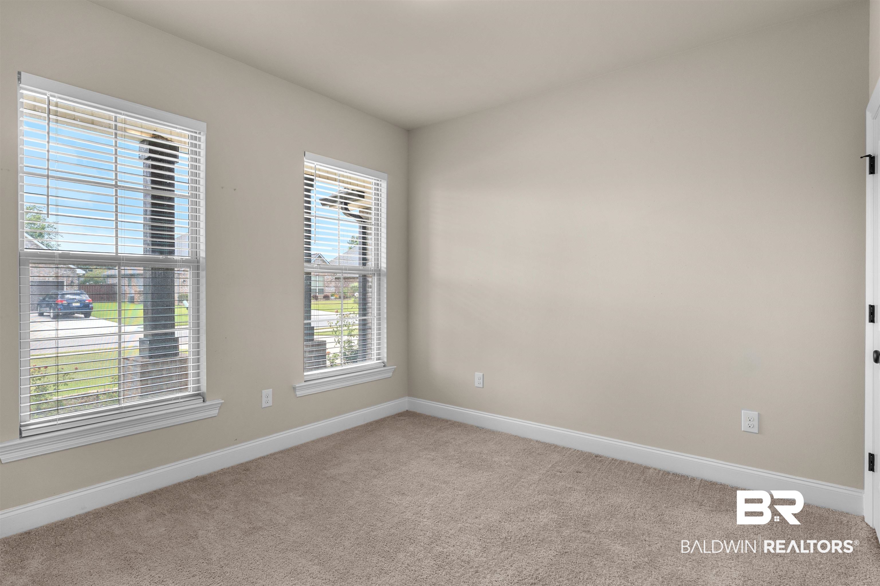 991 Dalton Circle Foley, AL 36535 - Photo 12 of 35 Carpeted spare room featuring baseboards