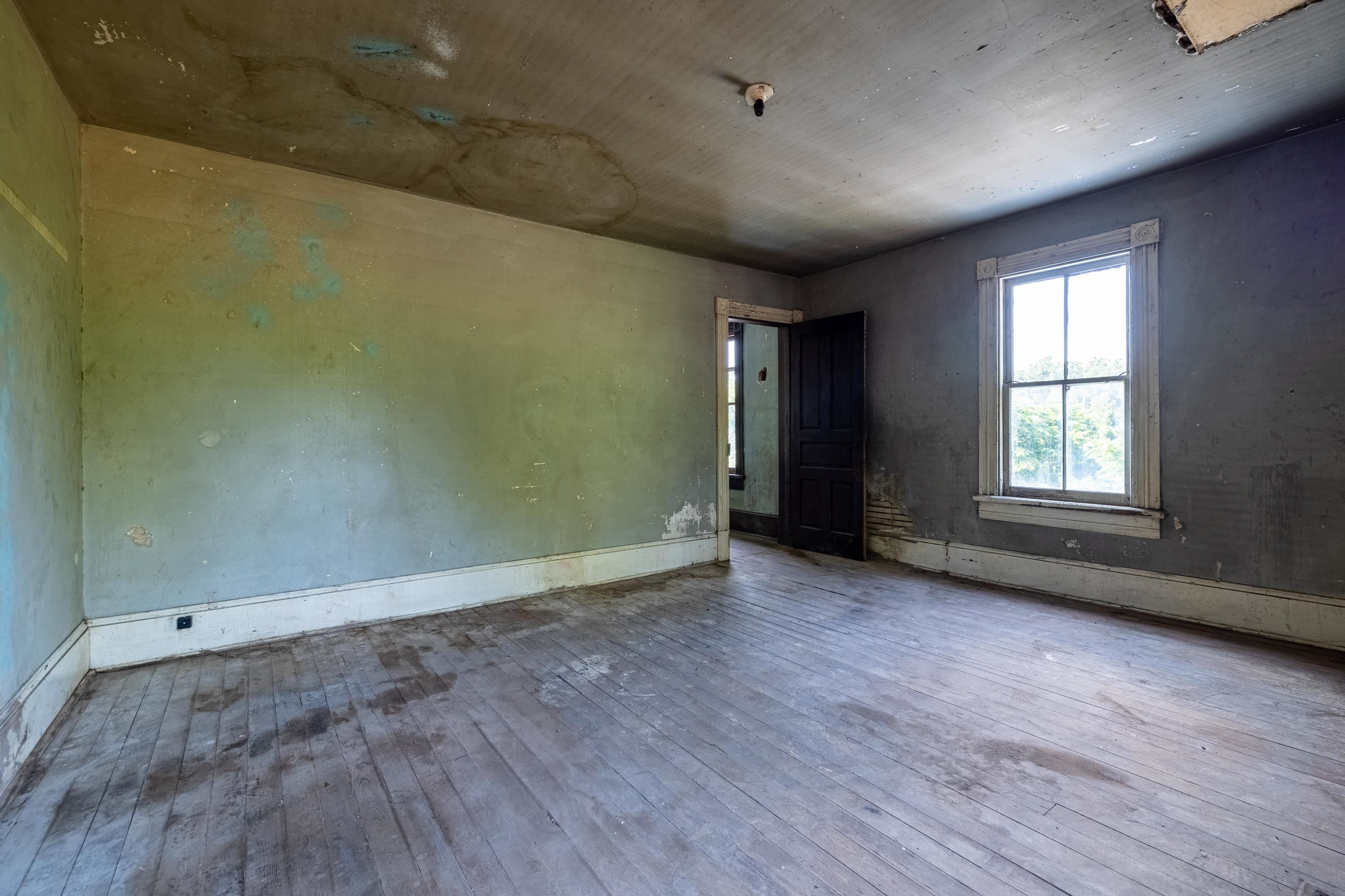 2012 Kimball Road Luray, VA 22835 - Photo 16 of 56 an empty room with wooden floor and windows