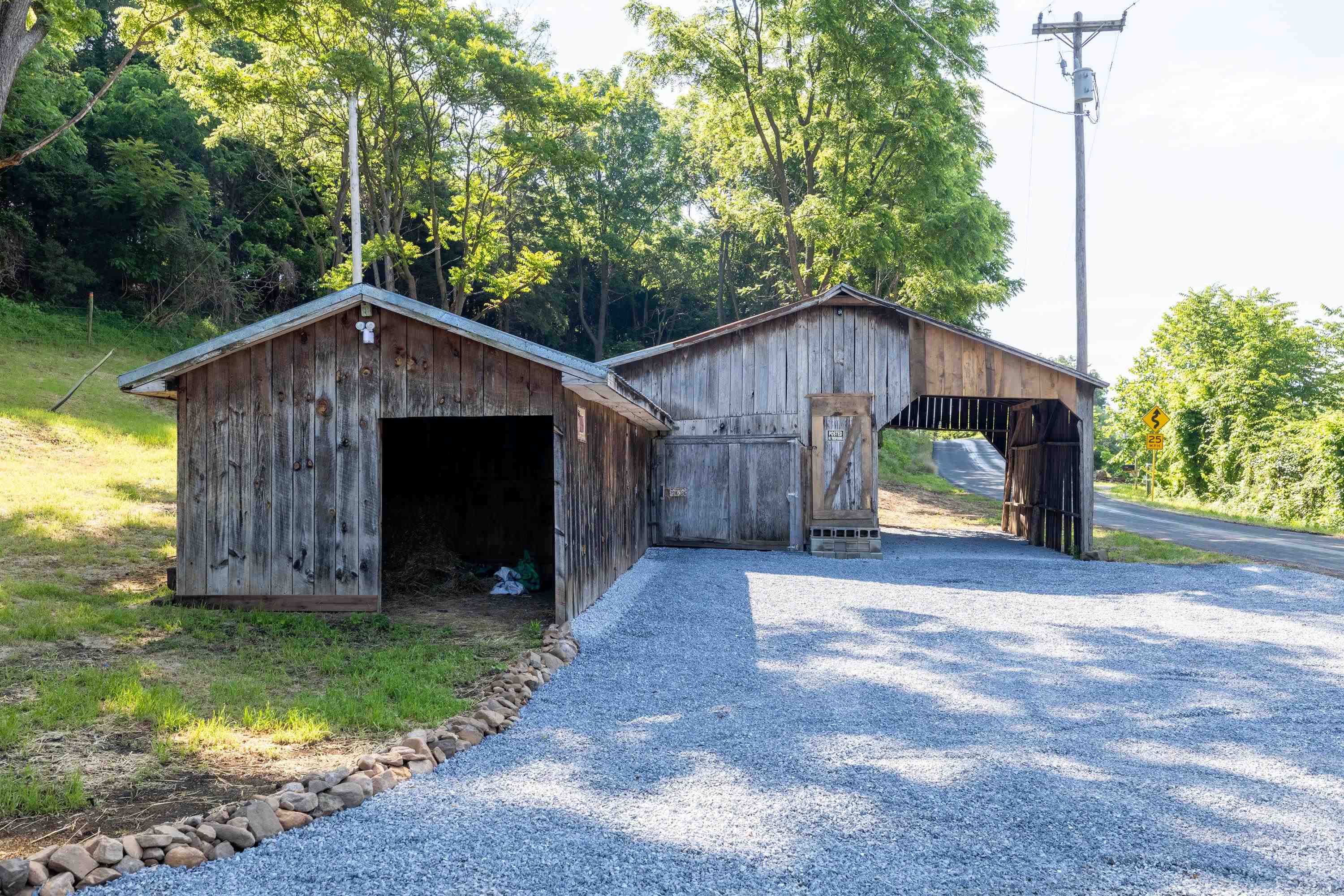 2012 Kimball Road Luray, VA 22835 - Photo 29 of 56 a view of a wooden house with a yard and large trees