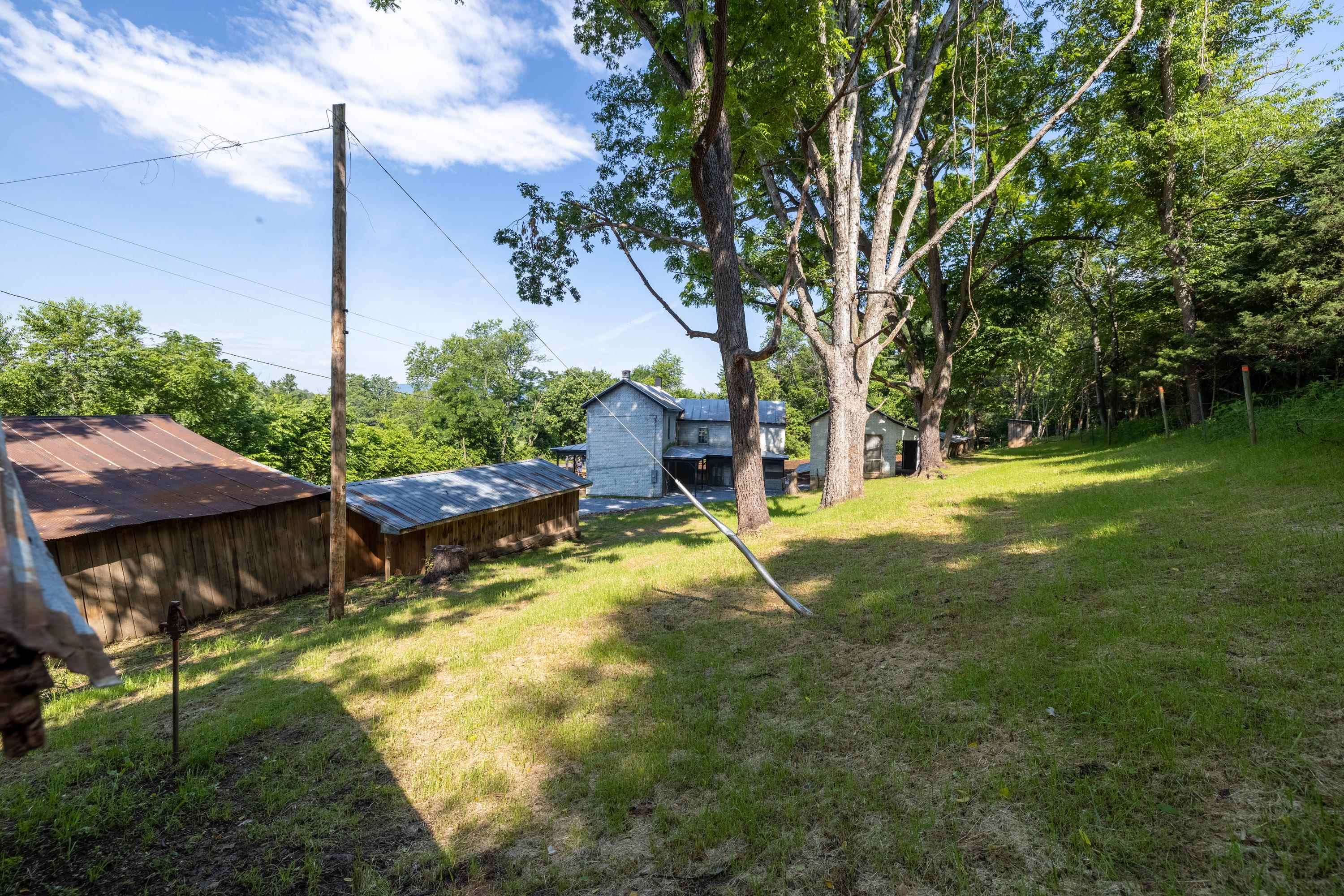 2012 Kimball Road Luray, VA 22835 - Photo 36 of 56 a backyard of a house with yard table and chairs