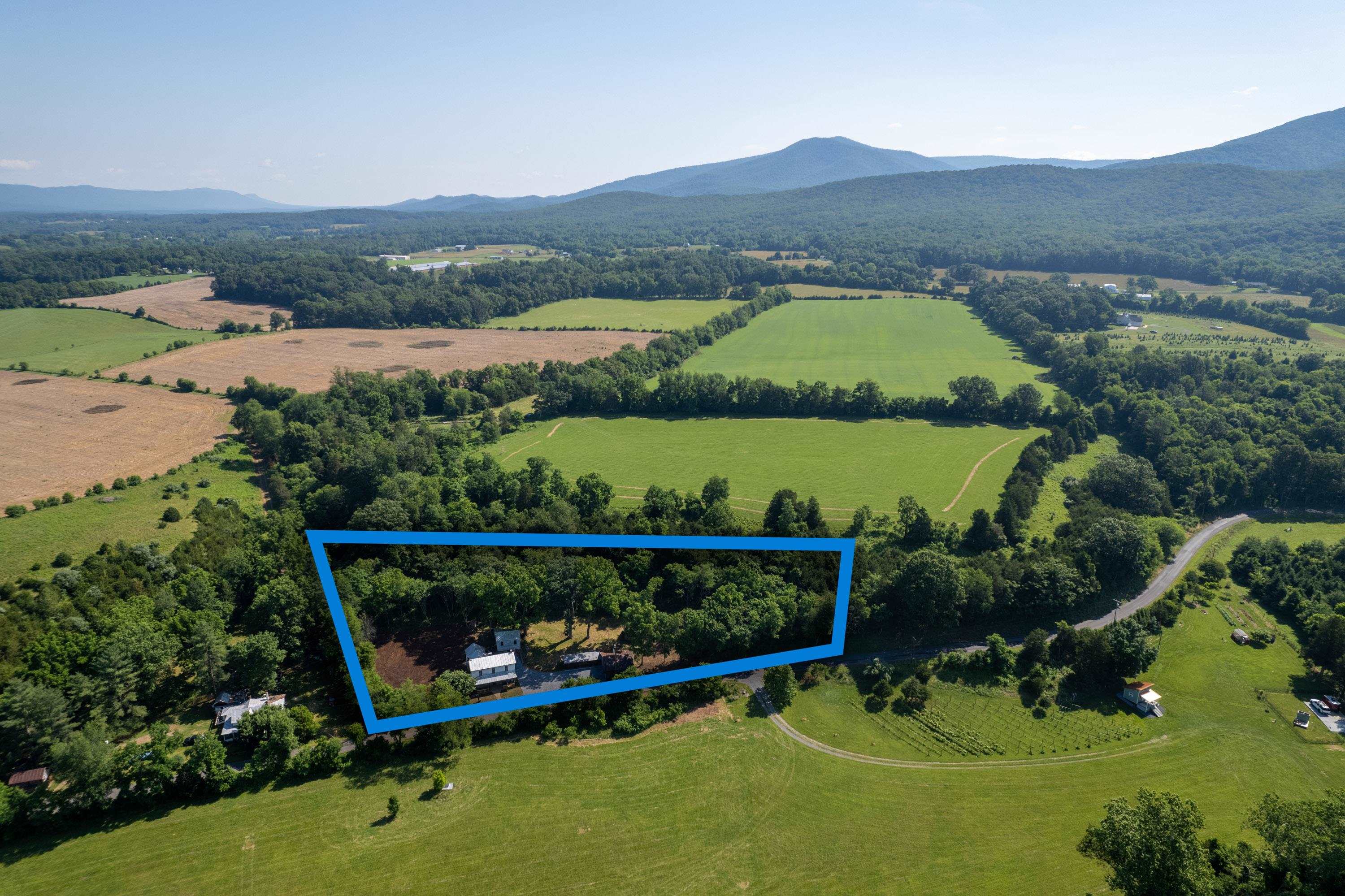 2012 Kimball Road Luray, VA 22835 - Photo 43 of 56 an aerial view of a house with a garden and a yard