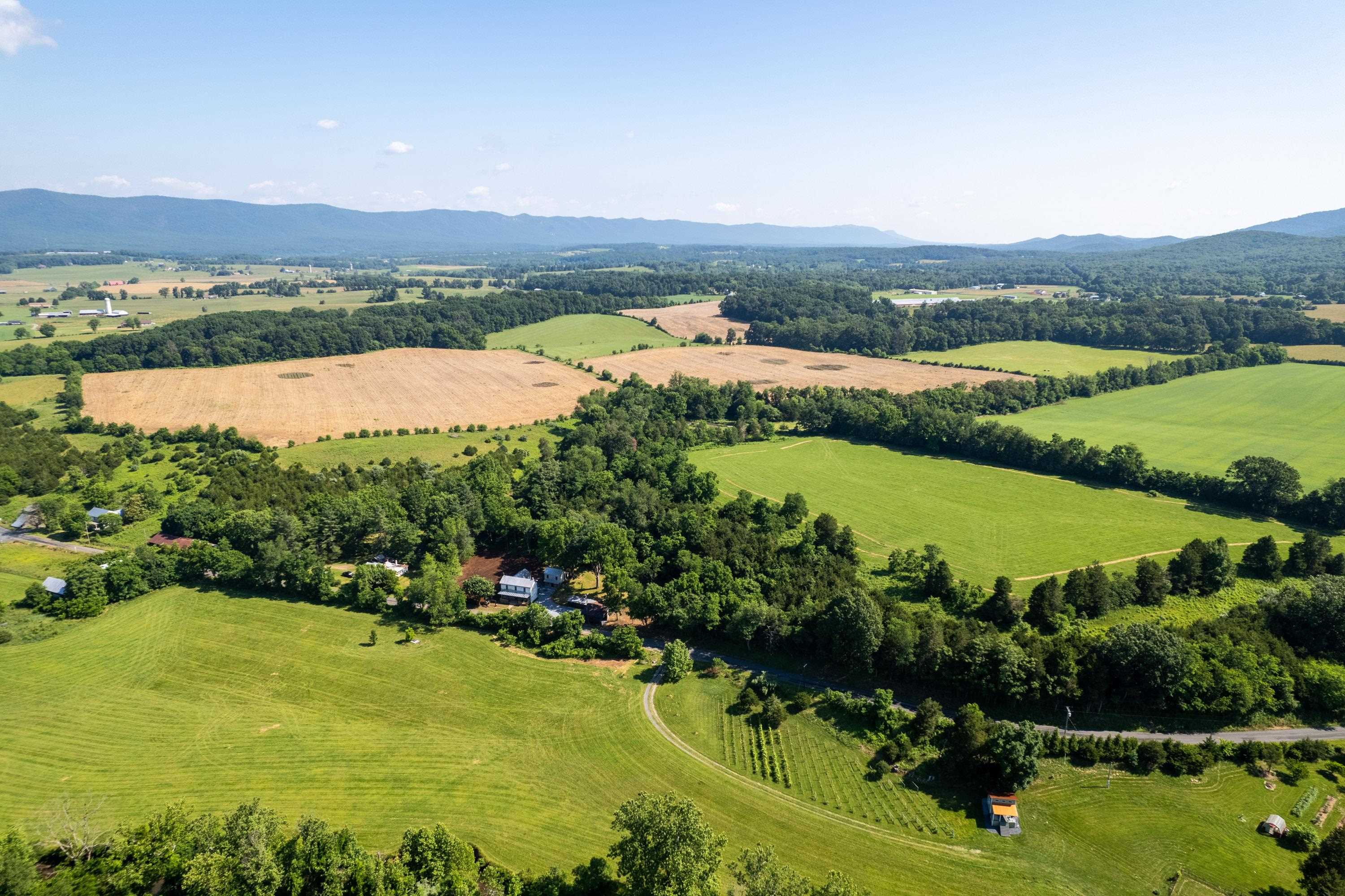 2012 Kimball Road Luray, VA 22835 - Photo 44 of 56 an aerial view of green landscape with trees houses and lake view