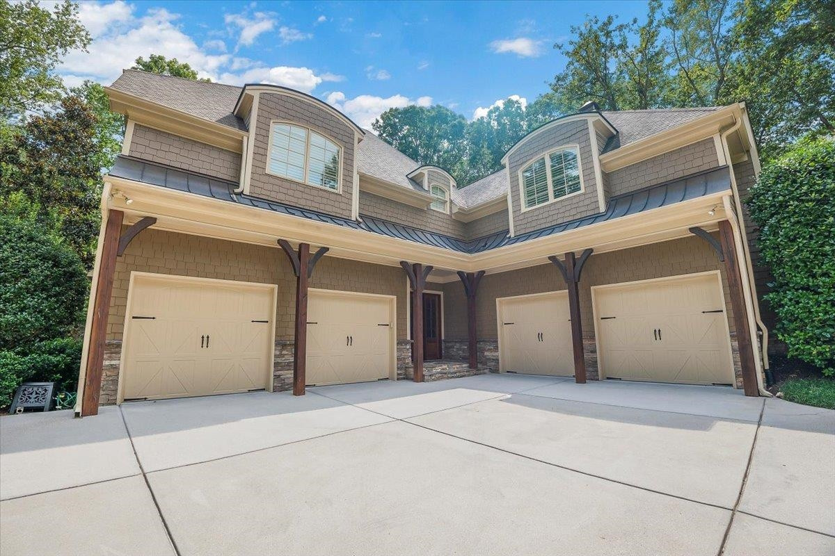 9712 Honeycutt Road Raleigh, NC 27614 - Photo 58 of 83 Side Mounted Garage Door Entry Pad for Each Garage and You are going to LOVE the Rust-Oleum "Rock Solid" Finish Four Car Garage Space