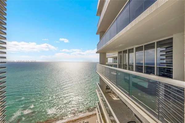 a view of an ocean from a balcony