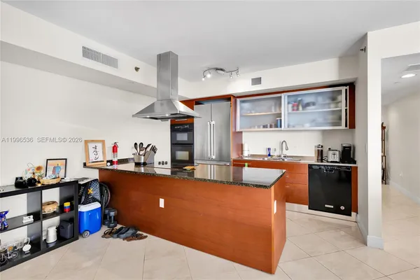 a view of kitchen and living room with furniture