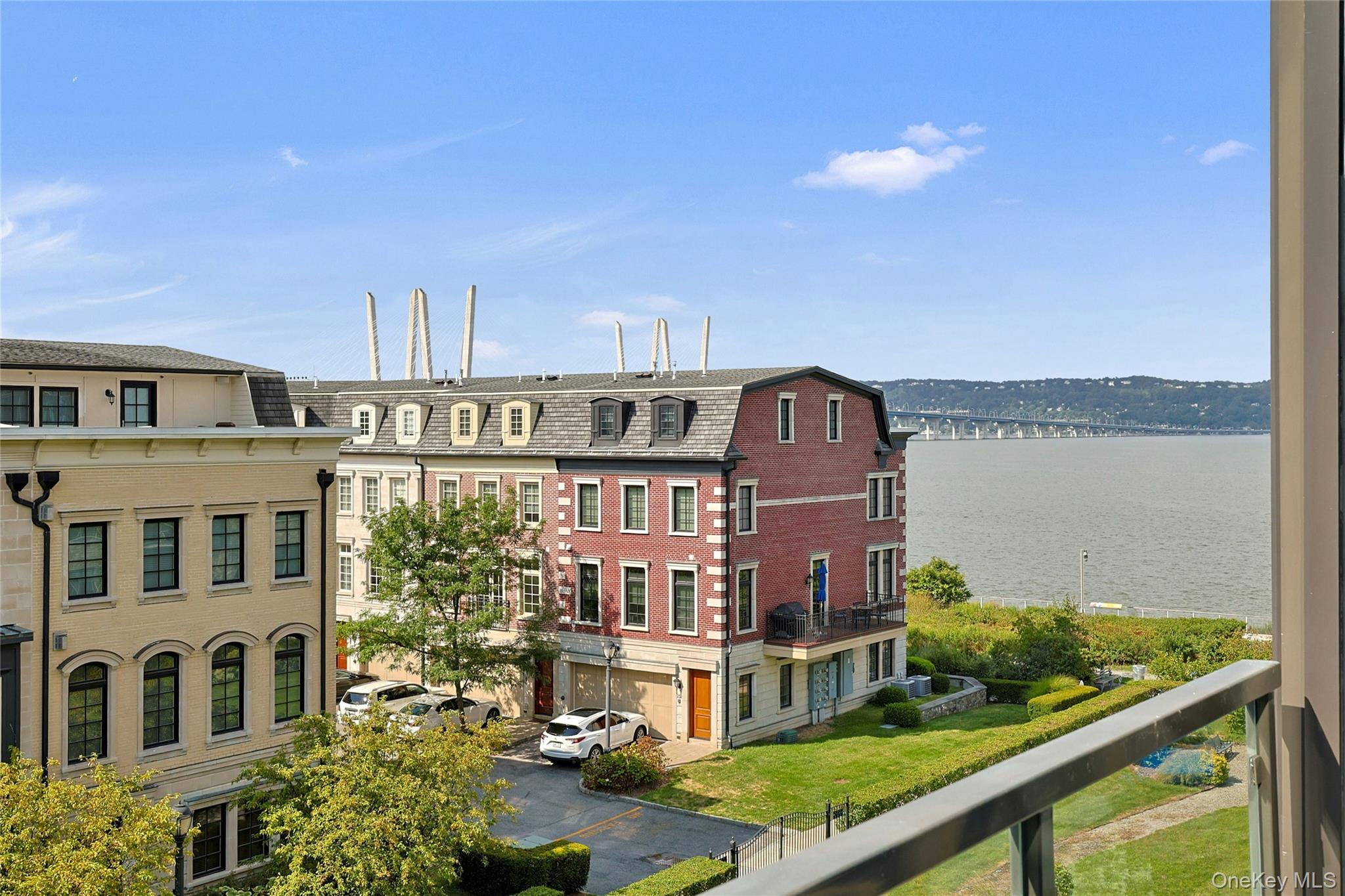 16 Rivers Edge Drive, Unit 408 Tarrytown, NY 10591 - Photo 1 of 1 a view of a lake with a building in the background