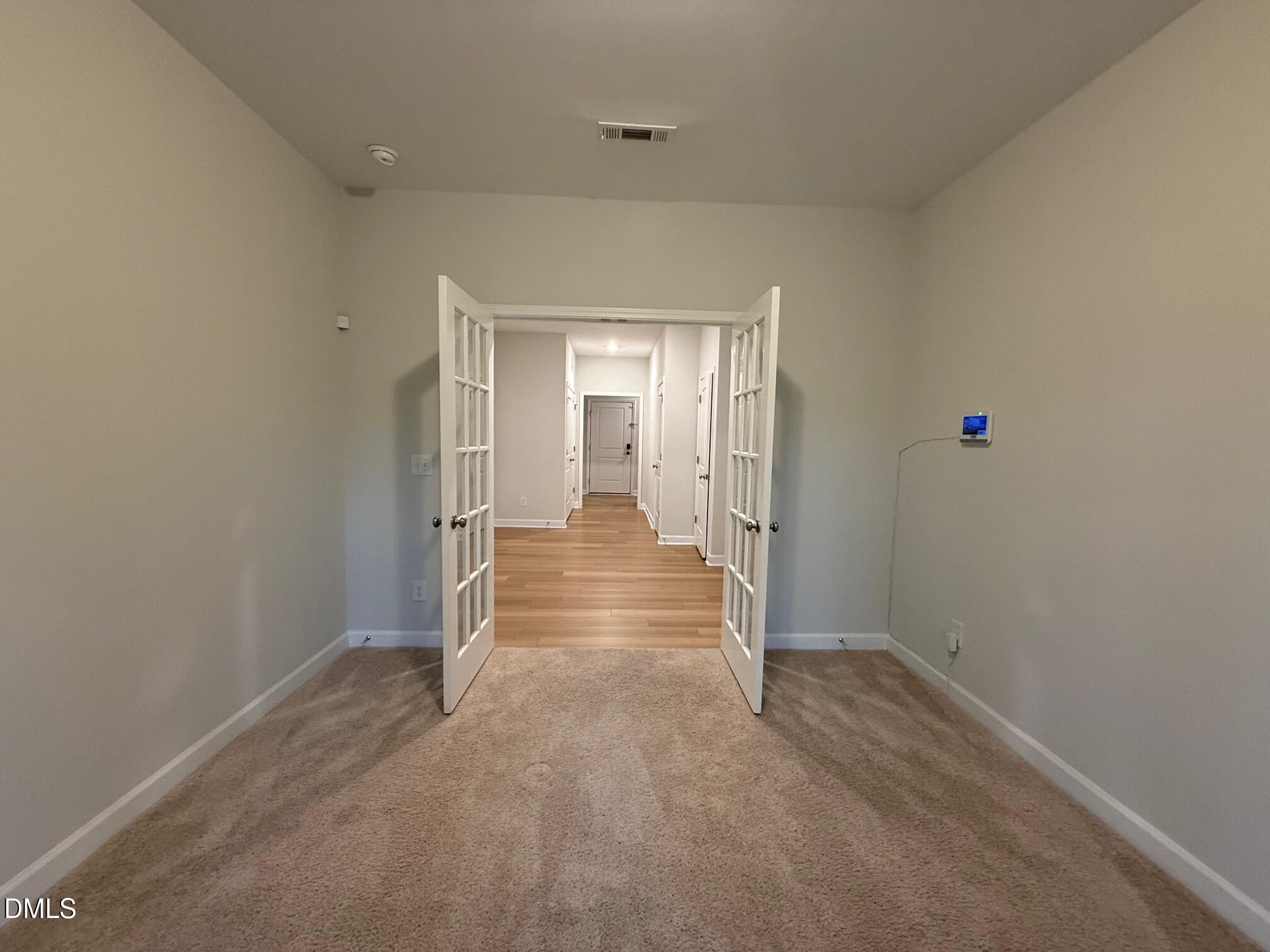 230 George Pine Way Knightdale, NC 27545 - Photo 12 of 31 a view of hallway with wooden floor